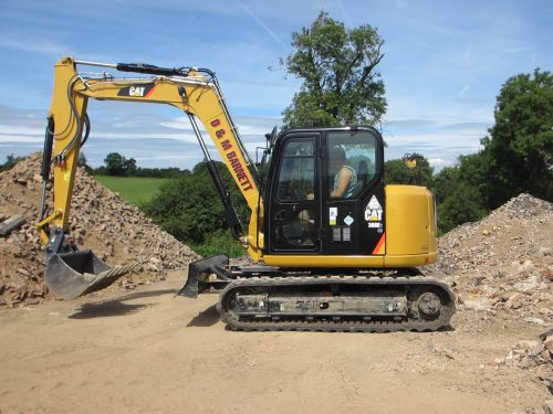 Click Here To Enlarge This Photo Of Excavators