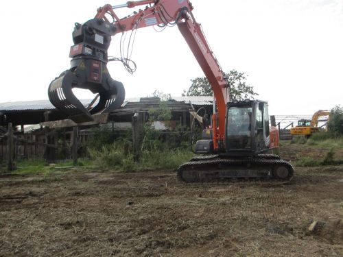Click Here To Enlarge This Photo Of Excavators