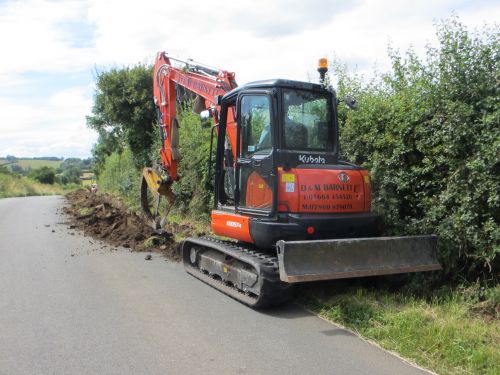 Click Here To Enlarge This Photo Of Excavators