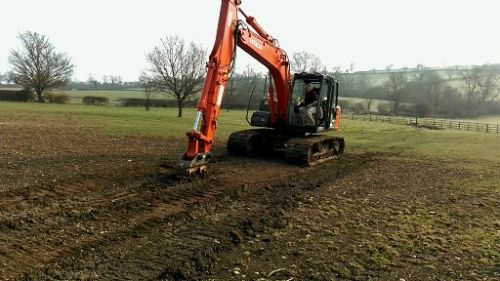 Click Here To Enlarge This Photo Of Excavators
