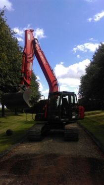 Click Here To Enlarge This Photo Of Excavators