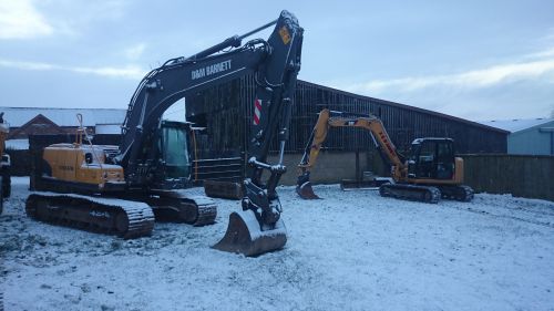 Click Here To Enlarge This Photo Of Excavators