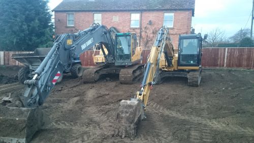 Click Here To Enlarge This Photo Of Excavators
